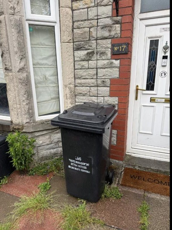The LBG crew emptying a wheelie bin on the morning round